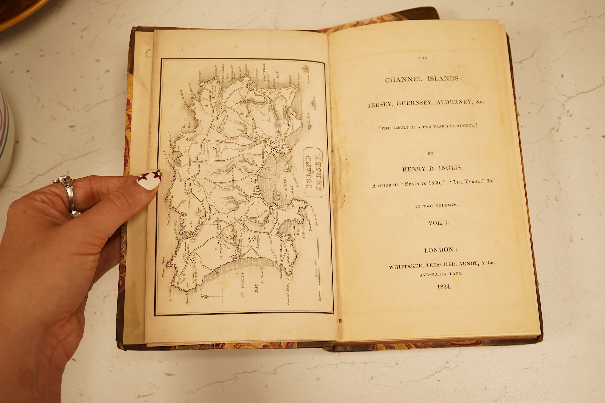Inglis, Henry D. - The Channel Islands ... [the result of two year's residence]. 2 vols. 2 maps; old half calf and marbled boards, gilt decorated and panelled spines, sm.8vo. 1834